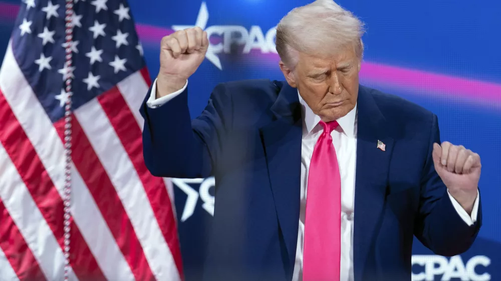 President Donald Trump dances after speaking at the Conservative Political Action Conference, CPAC, at the Gaylord National Resort & Convention Center, Saturday, Feb. 22, 2025, in Oxon Hill, Md. (AP Photo/Jose Luis Magana)