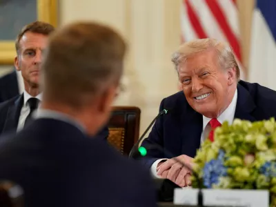 U.S. President Donald Trump meets French President Emmanuel Macron and Finland's President Alexander Stubb, amid negotiations to end the Russian war in Ukraine, at the White House in Washington, D.C., U.S., August 18, 2025. REUTERS/Al Drago