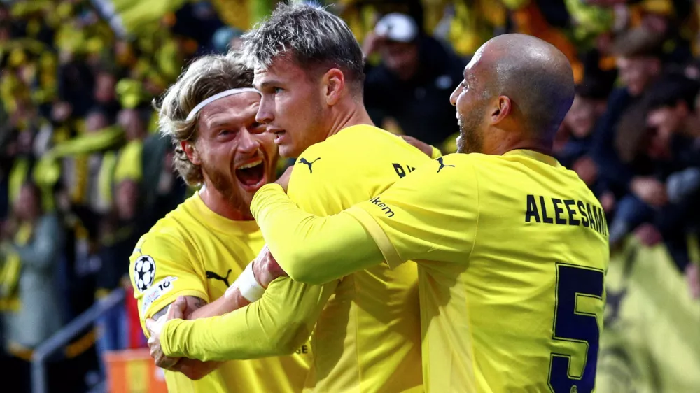 Soccer Football - UEFA Champions League - Play Off - First Leg - Bodo/Glimt v SK Sturm Graz - Aspmyra Stadion, Bodo, Norway - August 20, 2025 Bodo/Glimt's Odin Bjortuft celebrates scoring their second goal with teammates Mats Torbergsen/NTB via REUTERS  ATTENTION EDITORS - THIS IMAGE WAS PROVIDED BY A THIRD PARTY. NORWAY OUT. NO COMMERCIAL OR EDITORIAL SALES IN NORWAY.