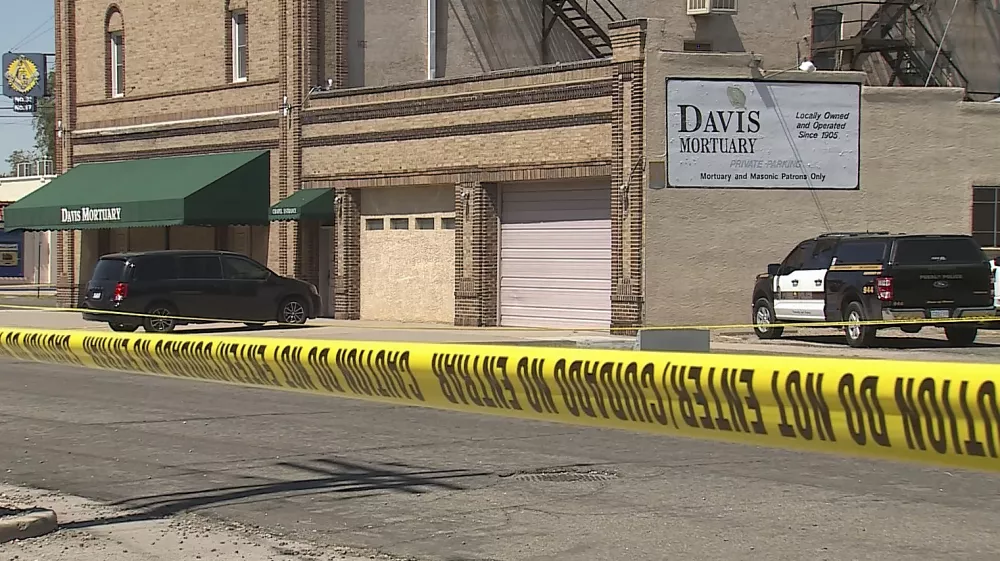 This image from video provided by KRDO13 shows Davis Mortuary in Pueblo, Colo., on Thursday, Aug. 21, 2025, where state inspectors found decomposing bodies behind a hidden door. (KRDO13 via AP)