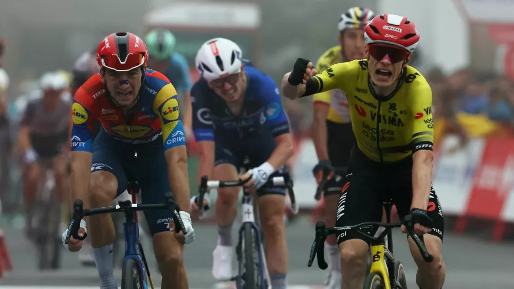 Cycling - Vuelta a Espana - Stage 2 - Alba to Limone Piemonte - Limone Piemonte, Italy - August 24, 2025 Team Visma | Lease A Bike's Jonas Vingegaard celebrates winning stage 2 REUTERS/Manon Cruz
