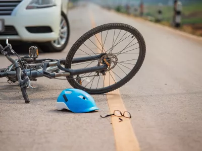 Accident car crash with bicycle on road because drunk driving.