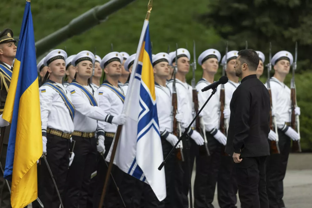 In this photo provided by the Ukrainian Presidential Press Office, Ukrainian President Volodymyr Zelenskyy attends the ceremony on the occasion of the National Flag Day in Kyiv, Ukraine, Saturday, Aug. 23, 2025. (Ukrainian Presidential Press Office via AP)