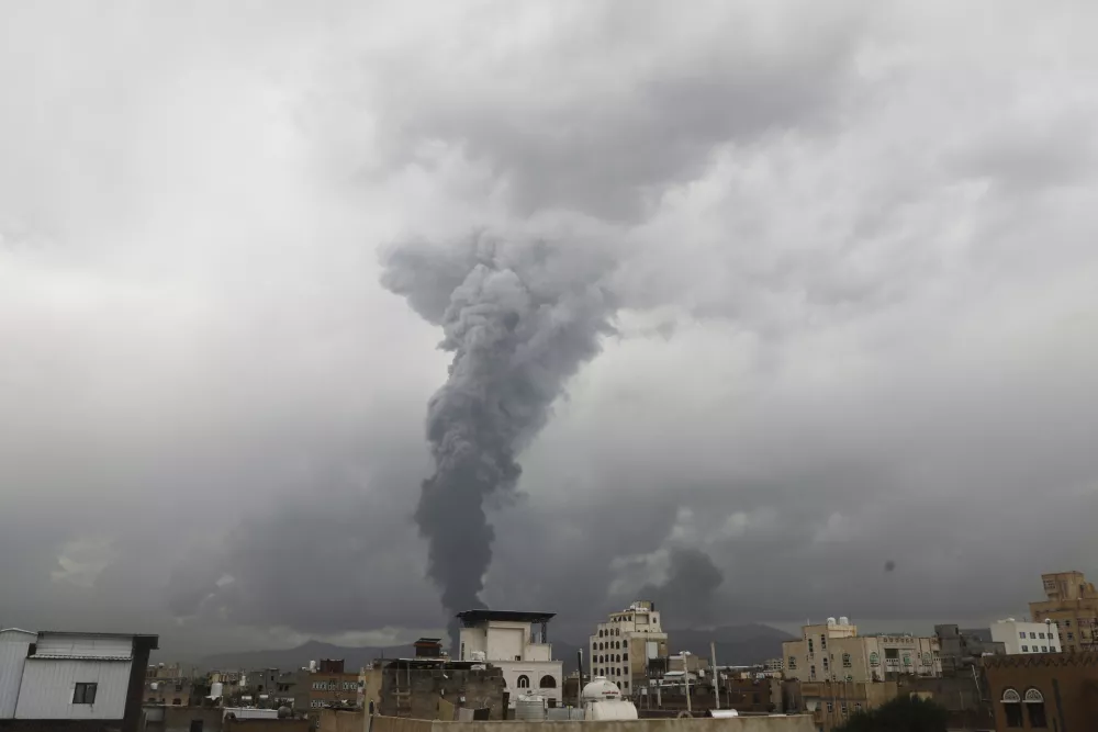 Smoke billows following Israeli airstrikes in multiple areas in Sanaa, Yemen, Sunday, Aug. 24, 2025. (AP Photo/Osamah Abdulrahman)