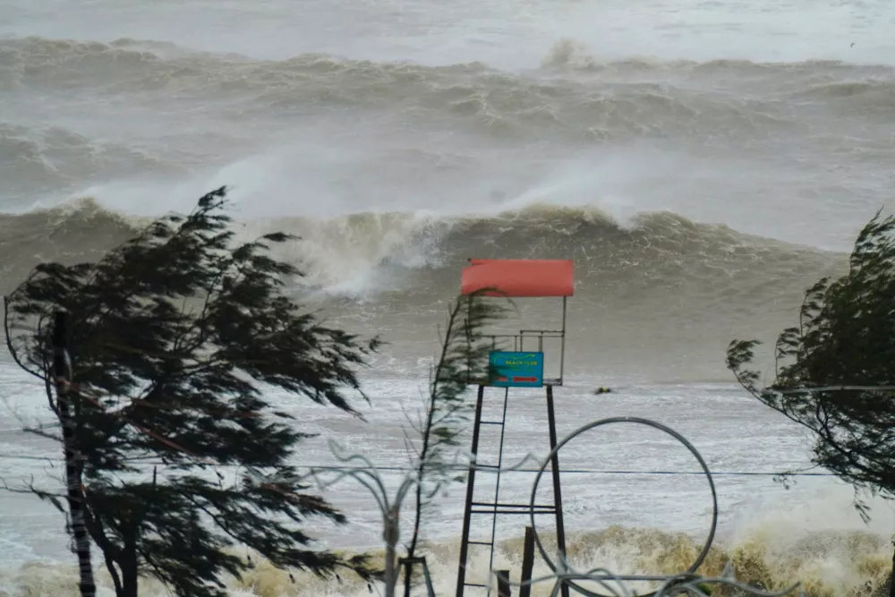 Waves surge in Ha Tinh province, Vietnam, Monday, Aug. 25, 2025, as Typhoon Kajiki was approaching. (Nguyen Dong/VNExpress via AP)