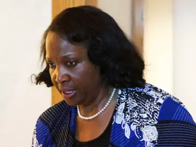 FILE PHOTO: Federal Reserve Governor Lisa Cook attends the Federal Reserve Bank of Kansas City's 2025 Jackson Hole economic symposium, "Labor Markets in Transition: Demographics, Productivity, and Macroeconomic Policy" in Jackson Hole, Wyoming, U.S., August 23, 2025. REUTERS/Jim Urquhart/File Photo