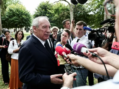France's Prime Minister Francois Bayrou speaks to the press during French Democratic Confederation of Labour (CFDT) trade union's Summer Conferences 'Universites d'ete' at the Bierville estate in Boissy-la-Riviere, south of Paris, France August 26, 2025.   THIBAUD MORITZ/Pool via REUTERS