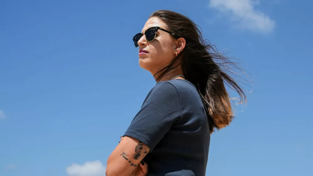 Doron Steinbrecher, a released hostage, who was held by Hamas in Gaza for 471 days, poses for a photograph, following an interview with Reuters, in Kibbutz Shefayim, Israel, August 25, 2025. REUTERS/Miro Maman