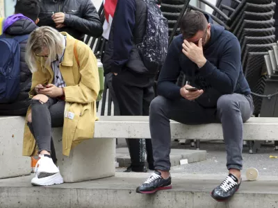 ﻿People use mobile phone (smartphone) in Prague, Czech Republic, September 23, 2019. Addiction to social networking, dating apps, texting, and messaging - nomophobia (irrational fear of being without mobile phone). Photo/Milos Ruml (CTK via AP Images)