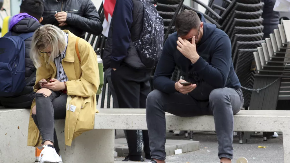 ﻿People use mobile phone (smartphone) in Prague, Czech Republic, September 23, 2019. Addiction to social networking, dating apps, texting, and messaging - nomophobia (irrational fear of being without mobile phone). Photo/Milos Ruml (CTK via AP Images)