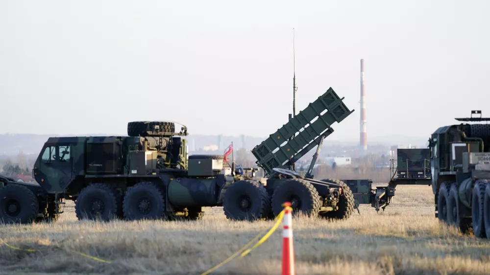 FILE - Patriot missiles are seen at the Rzeszow-Jasionka Airport, March 25, 2022, in Jasionka, Poland. The U.S. will send $1.8 billion in military aid to Ukraine in a massive package that will for the first time include a Patriot missile battery and precision guided bombs for their fighter jets, U.S. officials said Tuesday, Dec. 20, 2022, as the Biden administration prepares to welcome Ukrainian President Volodymyr Zelenskyy to Washington. (AP Photo/Evan Vucci, File)