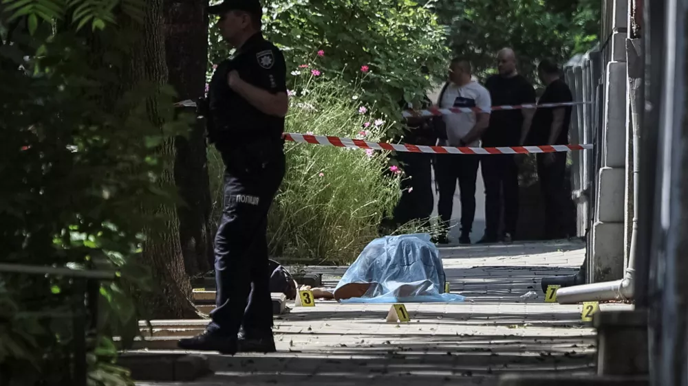 SENSITIVE MATERIAL. THIS IMAGE MAY OFFEND OR DISTURB The body of former Ukrainian parliamentary speaker Andriy Parubiy, who was killed this morning, lies on the ground, amid Russia's attack on Ukraine, in Lviv, Ukraine August 30, 2025. REUTERS/Roman Baluk