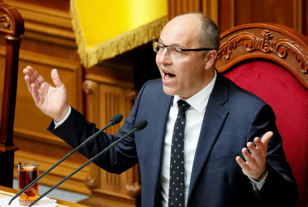 FILE PHOTO: Andriy Parubiy, who at the time was Ukrainian Parliamentary Speaker, reacts during a session of parliament in Kiev, Ukraine, May 22, 2019. REUTERS/Valentyn Ogirenko/File Photo