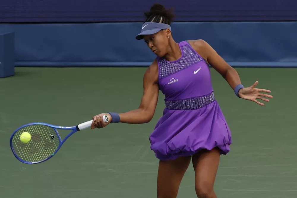 Aug 30, 2025; Flushing, NY, USA; Naomi Osaka (JPN) hits a forehand against Daria Kasatkina (not pictured) on day seven of the 2025 US Open tennis championships at Billie Jean King National Tennis Center. Mandatory Credit: Geoff Burke-Imagn Images