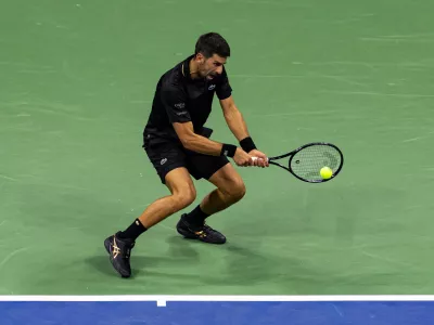 Aug 31, 2025; Flushing, NY, USA; Novak Djokovic of Serbia in action against Jan-Lennard Struff of Germany in the fourth round of the men's singles at the US Open at Arthur Ashe Stadium in Billie Jean King National Tennis Center. Mandatory Credit: Mike Frey-Imagn Images