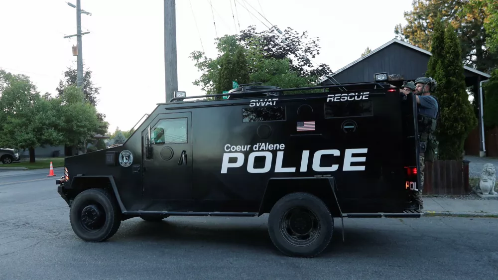 An armored police vehicle leaves an area where multiple firefighters were attacked when responding to a fire in the Canfield Mountain area outside Coeur d'Alene, Idaho, U.S. June 29, 2025. REUTERS/Young Kwak