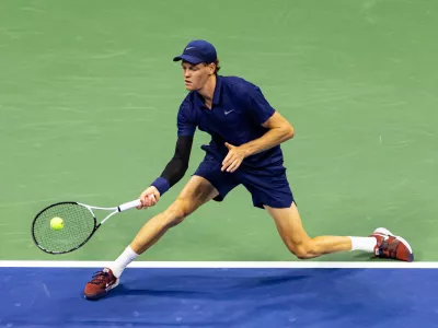 Sep 1, 2025; Flushing, NY, USA; Jannik Sinner of Italy in action against Alexander Bublik of Kazakhstan in the fourth round of the men's singles at the US Open at Arthur Ashe Stadium in Billie Jean King National Tennis Center. Mandatory Credit: Mike Frey-Imagn Images