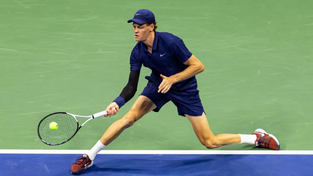 Sep 1, 2025; Flushing, NY, USA; Jannik Sinner of Italy in action against Alexander Bublik of Kazakhstan in the fourth round of the men's singles at the US Open at Arthur Ashe Stadium in Billie Jean King National Tennis Center. Mandatory Credit: Mike Frey-Imagn Images