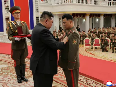 North Korean leader Kim Jong attends a national commendation ceremony for the commanders and fighters of the Korean People's Army's overseas operations unit, at the headquarters of the Central Committee of the Korean Workers' Party, in Pyongyang, North Korea, in this photo released on August 22, 2025 by North Korea's Korean Central News Agency (KCNA). KCNA via REUTERS ATTENTION EDITORS - THIS IMAGE WAS PROVIDED BY A THIRD PARTY. REUTERS IS UNABLE TO INDEPENDENTLY VERIFY THIS IMAGE. NO THIRD PARTY SALES. SOUTH KOREA OUT. NO COMMERCIAL OR EDITORIAL SALES IN SOUTH KOREA.