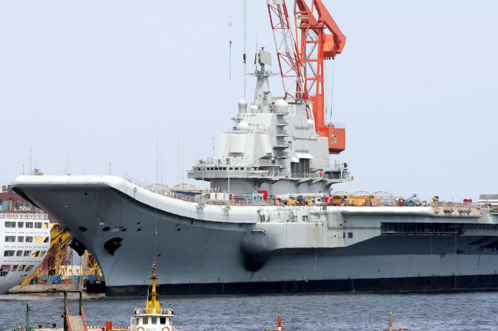 The aircraft carrier Varyag is being renovated at a shipyard in Dalian city, northeast Chinas Liaoning province, 17 July 2011.Chinas first aircraft carrier, a retrofitted ship bought from Ukraine in 1998, is expected to be mainly used for training purposes and could begin sea trials within a few weeks, a state-run newspaper reported. The former Soviet carrier Varyag, once destined to become a floating casino, is part of Chinas push to modernize the navy. Chinese military and political sources have said Beijing could launch the carrier this year, as China marks 90 years since the founding of the ruling Communist Party. Such a launch would be a first, exploratory step towards an operational carrier fleet.(Imaginechina via AP Images)