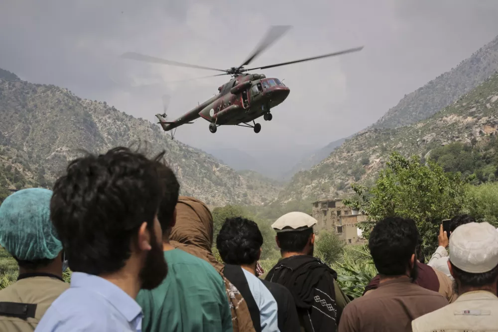 A military helicopter carrying Injured victims of an earthquake that killed many people and destroyed villages in eastern Afghanistan takes off in Mazar Dara, Kunar province, Afghanistan, Monday, Sept. 1, 2025. (AP Photo/Wahidullah Kakar)