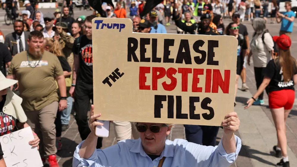 Anti-Trump demonstrators march near the U.S. Capitol, protesting against issues including the Jeffrey Epstein case and the increased presence of military and federal law enforcement in the D.C area ordered by U.S President Donald Trump, in Washington, D.C., U.S. September 2, 2025. REUTERS/Jonathan Ernst