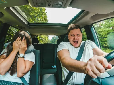 couple all most get car accident. not safe driving. insurance concept