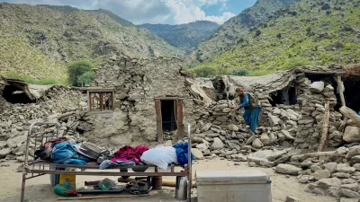 An Afghan man looks for his belongings amidst the rubble of his collapsed house after a deadly magnitude 6 earthquake that struck Afghanistan on Sunday, at Lulam village, in Nurgal district, Kunar province, Afghanistan, September 3, 2025. REUTERS/Sayed Hassib