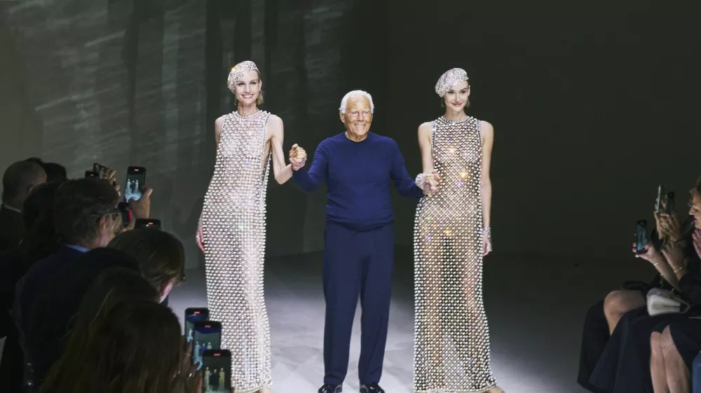 FILE -- Giorgio Armani with models at the end of his Privé fashion show during Paris Fashion Week in Paris, June 25, 2024. Armani, a designer who rewrote the rules of fashion not once but twice in his lifetime, has died. His death was confirmed on Thursday, Sept. 4, 2025, in a statement by the Armani Group. He was 91.,Image: 1034258029, License: Rights-managed, Restrictions: A JUNE 25, 2024 FILE PHOTO., Model Release: no