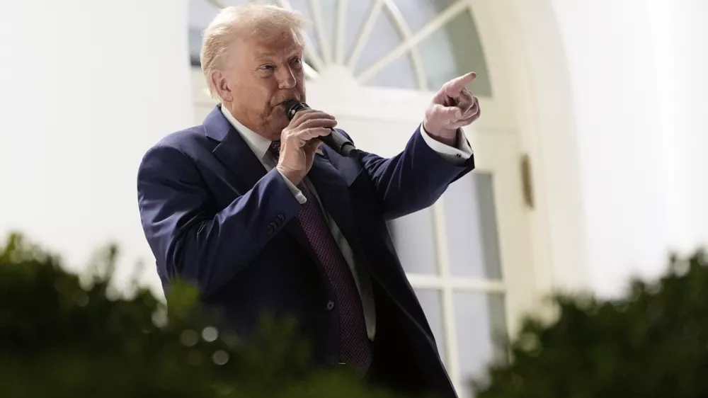 President Donald Trump speaks at a dinner in the Rose Garden of the White House, Friday, Sept. 5, 2025, in Washington. (AP Photo/Alex Brandon)