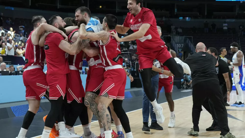 Basketball - FIBA EuroBasket 2025 - Round of 16 - France v Georgia - Xiaomi Arena, Riga, Latvia - September 7, 2025 Georgia players celebrate after the match REUTERS/Ints Kalnins