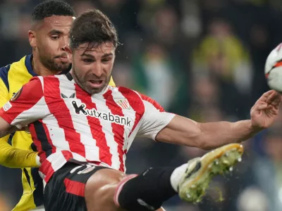 FILE - Athletic Bilbao's Yeray Alvarez, front, kicks the ball during the Europa League opening phase soccer match between Fenerbahce and Athletic Bilbao at Sukru Saracoglu stadium, in Istanbul, Turkey, Dec. 11, 2024. (AP Photo/Francisco Seco, File)