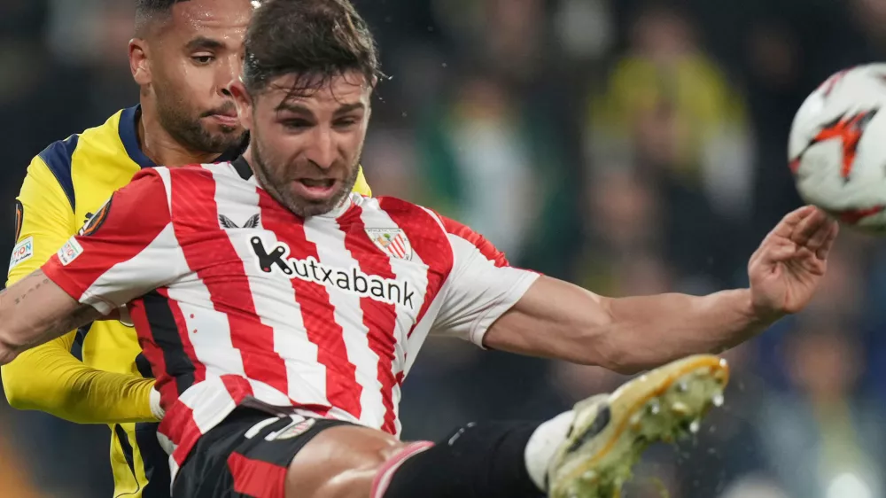 FILE - Athletic Bilbao's Yeray Alvarez, front, kicks the ball during the Europa League opening phase soccer match between Fenerbahce and Athletic Bilbao at Sukru Saracoglu stadium, in Istanbul, Turkey, Dec. 11, 2024. (AP Photo/Francisco Seco, File)