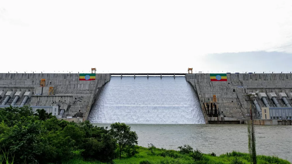 Large Ethiopian flags are displayed on the Grand Ethiopian Renaissance Dam (GERD), built along the Blue Nile, during its inauguration, in Guba, Benishangul-Gumuz region, Ethiopia, September 9, 2025. REUTERS/ Tiksa Negeri