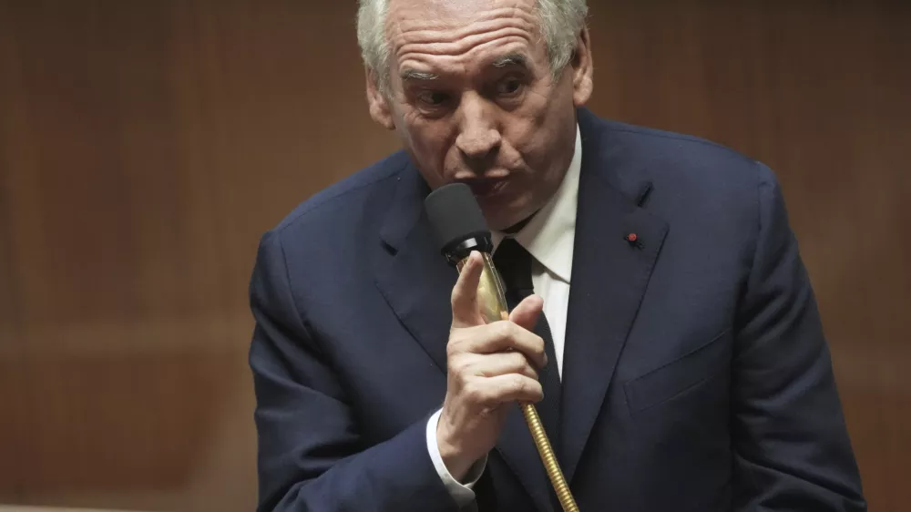 FILE - French Prime Minister Francois Bayrou addresses the National Assembly, prior to a parliamentary confidence vote that could bring him down, Monday, Sept. 8, 2025 in Paris. (AP Photo/Christophe Ena, File)
