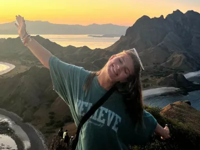 Story from Jam Press (Five Jobs Travel) Pictured: Lauren on her travels.Woman, 20, works 60-hour weeks with FIVE jobs and ditches pub and takeaway coffees to realise dreamA young woman has revealed how she worked five jobs at once in order to save money to travel the world.Lauren Wright was determined to leave the UK for pastures new the moment she turned 18 – but even budget-friendly backpacking comes at a steep cost.In order to fund her adventures, she started saving at the age of 15 and took on as many jobs as possible to make her dreams a reality.She spent an intense period of six months prior to her travels taking on five roles – including as a lifeguard, duty manager, team leader, receptionist and recreational assistant in various roles."I poured my heart and soul into working to save for my trip," the 20-year-old, who has visited more than a dozen countries, told Luxury Travel Daily."Most of them [the jobs] were zero-hour contracts, which allowed me to work as much or as little as I wanted."I jam-packed those six months, sometimes working 60-hour weeks and 18-hour shifts, going straight from one job to another throughout the day."I would get exhausted as I would sometimes give myself only one day off in a stretch of nine days back-to-back, and would then jump straight into the grind."However, I was driven and had my eye on the prize, making me constantly motivated."I don't think I would change a single thing."I am very proud of myself for what I have managed to achieve." For Lauren, being money savvy started back in her early teens.She said: "I am very fortunate to have such supportive and loving parents who made my saving process easier than most."I had very minimal outgoings, and therefore, every penny I made, I was able to save for my trip."I reached out to friends who had taken very similar trips and asked how much they had saved, setting myself a goal of around Ł14,000 as I never wanted to run out of money or feel like I couldn't participate in a once-in-a-lifetime activity while I was away."I have always been good at saving my money, saving more than spending, from the time I started working at 15."She combined these savings with the money saved in the intense period where she covered various jobs.Saving up didn't come without its sacrifices, and Lauren had to ditch a few luxuries and home comforts in order to meet her goal.She said: "I stopped eating out as much, reduced the amount of takeout coffee I would buy whilst out and about and started making more at home to save money."I also reduced the number of pub trips I went on with friends."Most importantly, I stopped all unessential shopping unless I was buying something that I was going to be able to take on my travels."Thanks to her savvy saving, Lauren has managed to visit many countries around the world, and have once-in-a-lifetime experiences she will remember forever.She added: "I have backpacked to Dubai, the Philippines, Thailand, Laos, Cambodia, Vietnam, Indonesia, Malaysia, Singapore, Australia and New Zealand, as well as being lucky enough to travel a huge chunk of Europe, too."I initially started travelling with my boyfriend, but we broke up on the trip, causing me to travel solo, which taught me so many lessons and helped me to meet amazing people I may not have met otherwise."I wouldn't change my travels for the world, and I can't wait to see even more of the world as I continue to grow."According to the budget traveller, the best advice she has for those wanting to save money to travel the world is to research other people's journeys on social media, especially TikTok.Lauren told travel booking site Omio: "I did a lot of TikTok research, watching videos on how much money people spent per location and for their entire trip."I used all these figures to set a budget for myself of around Ł30 a day while I was in the more 'budget-friendly' countries such as Thailand, Vietnam, Cambodia, Malaysia and Laos."This Ł30 a day would include my hostel or hotel, food, activities and basic fees such as my SIM card and laundry."I had a separate budget for activities, which was definitely needed to make the most of my trip."In the more expensive countries like Singapore, Indonesia, New Zealand and Australia, I would attempt to budget by seeing how much I was spending daily and trying to stick to that average, like Ł60 a day, which also included accommodation, which was much more expensive in these countries."I also didn't eat out as much in Australia and New Zealand, and often opted for grocery shopping and cooking in the hostel's kitchen."I would advise everyone planning a similar trip to do their research."TikTok is brilliant as you get people's first-hand experience, which can help you figure out what you want your trip to look like, for example, whether you want to stay in hotels or hostels."Sometimes, if you share a hotel room with a partner or friend, it works out cheaper, but then you may not get the social aspect of a hostel, so it really depends on what you want to prioritise."If you are on a tight budget, you can always opt for cheaper foods, such as eating street food at night markets rather than at restaurants."This way, you can experience the culture's food at a fraction of the cost."ENDS,Image: 1035475088, License: Rights-managed, Restrictions:, Model Release: no