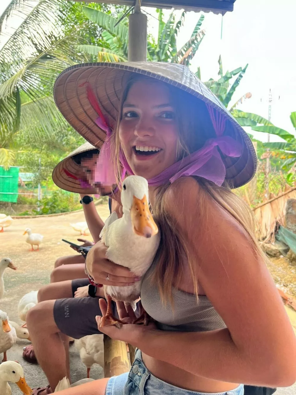 Story from Jam Press (Five Jobs Travel) Pictured: Lauren on her travels.Woman, 20, works 60-hour weeks with FIVE jobs and ditches pub and takeaway coffees to realise dreamA young woman has revealed how she worked five jobs at once in order to save money to travel the world.Lauren Wright was determined to leave the UK for pastures new the moment she turned 18 – but even budget-friendly backpacking comes at a steep cost.In order to fund her adventures, she started saving at the age of 15 and took on as many jobs as possible to make her dreams a reality.She spent an intense period of six months prior to her travels taking on five roles – including as a lifeguard, duty manager, team leader, receptionist and recreational assistant in various roles."I poured my heart and soul into working to save for my trip," the 20-year-old, who has visited more than a dozen countries, told Luxury Travel Daily."Most of them [the jobs] were zero-hour contracts, which allowed me to work as much or as little as I wanted."I jam-packed those six months, sometimes working 60-hour weeks and 18-hour shifts, going straight from one job to another throughout the day."I would get exhausted as I would sometimes give myself only one day off in a stretch of nine days back-to-back, and would then jump straight into the grind."However, I was driven and had my eye on the prize, making me constantly motivated."I don't think I would change a single thing."I am very proud of myself for what I have managed to achieve." For Lauren, being money savvy started back in her early teens.She said: "I am very fortunate to have such supportive and loving parents who made my saving process easier than most."I had very minimal outgoings, and therefore, every penny I made, I was able to save for my trip."I reached out to friends who had taken very similar trips and asked how much they had saved, setting myself a goal of around Ł14,000 as I never wanted to run out of money or feel like I couldn't participate in a once-in-a-lifetime activity while I was away."I have always been good at saving my money, saving more than spending, from the time I started working at 15."She combined these savings with the money saved in the intense period where she covered various jobs.Saving up didn't come without its sacrifices, and Lauren had to ditch a few luxuries and home comforts in order to meet her goal.She said: "I stopped eating out as much, reduced the amount of takeout coffee I would buy whilst out and about and started making more at home to save money."I also reduced the number of pub trips I went on with friends."Most importantly, I stopped all unessential shopping unless I was buying something that I was going to be able to take on my travels."Thanks to her savvy saving, Lauren has managed to visit many countries around the world, and have once-in-a-lifetime experiences she will remember forever.She added: "I have backpacked to Dubai, the Philippines, Thailand, Laos, Cambodia, Vietnam, Indonesia, Malaysia, Singapore, Australia and New Zealand, as well as being lucky enough to travel a huge chunk of Europe, too."I initially started travelling with my boyfriend, but we broke up on the trip, causing me to travel solo, which taught me so many lessons and helped me to meet amazing people I may not have met otherwise."I wouldn't change my travels for the world, and I can't wait to see even more of the world as I continue to grow."According to the budget traveller, the best advice she has for those wanting to save money to travel the world is to research other people's journeys on social media, especially TikTok.Lauren told travel booking site Omio: "I did a lot of TikTok research, watching videos on how much money people spent per location and for their entire trip."I used all these figures to set a budget for myself of around Ł30 a day while I was in the more 'budget-friendly' countries such as Thailand, Vietnam, Cambodia, Malaysia and Laos."This Ł30 a day would include my hostel or hotel, food, activities and basic fees such as my SIM card and laundry."I had a separate budget for activities, which was definitely needed to make the most of my trip."In the more expensive countries like Singapore, Indonesia, New Zealand and Australia, I would attempt to budget by seeing how much I was spending daily and trying to stick to that average, like Ł60 a day, which also included accommodation, which was much more expensive in these countries."I also didn't eat out as much in Australia and New Zealand, and often opted for grocery shopping and cooking in the hostel's kitchen."I would advise everyone planning a similar trip to do their research."TikTok is brilliant as you get people's first-hand experience, which can help you figure out what you want your trip to look like, for example, whether you want to stay in hotels or hostels."Sometimes, if you share a hotel room with a partner or friend, it works out cheaper, but then you may not get the social aspect of a hostel, so it really depends on what you want to prioritise."If you are on a tight budget, you can always opt for cheaper foods, such as eating street food at night markets rather than at restaurants."This way, you can experience the culture's food at a fraction of the cost."ENDS,Image: 1035475098, License: Rights-managed, Restrictions:, Model Release: no