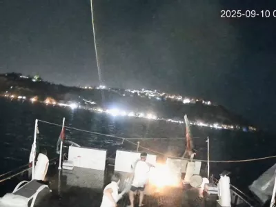 A CCTV footage shows men on board dousing a fire that struck Alma, a vessel of the Global Sumud Flotilla (GSF), in the Tunisian waters off the coast of Tunisia, September 9, 2025, in this screengrab obtained from a handout video.  GLOBAL SUMUD FLOTILLA/Handout via REUTERS  THIS IMAGE HAS BEEN SUPPLIED BY A THIRD PARTY. NO RESALES. NO ARCHIVES. MANDATORY CREDIT. VERIFICATION - Reuters was able to confirm the vessel from characteristics of ship exterior that matched file images. - Reuters was able to locate the footage from ship tracking websites and topography of the landscape and the shape and position of the road matched satellite imagery of the area. - Reuters was able to confirm the date of footage with Global Sumud Flotilla spokesperson, Wael Nawar. - Nawar also told Reuters that the timestamp difference shown on footage was likely due to camera being installed in Spain, which was an hour ahead of Tunisia.