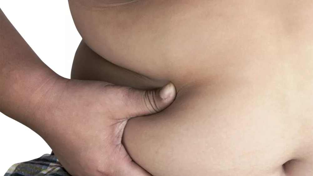 ﻿Children boy fat on isolated white background.