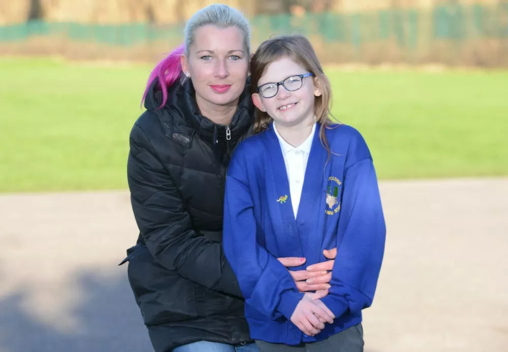 Olivia Farnsworth with her mum Niki both from Huddersfield, West Yorks., See Ross Parry Copy RPYBIONIC: Doctors have dubbed a seven-year-old with a rare disorder the "bionic girl" - because she doesn't feel tired, hungry or even PAIN. Unique Olivia Farnsworth has a rare chromosome condition that has left medics and her family stunned. It is thought she could be the only person in the world to exhibit the three symptoms together. When she was diagnosed, the consultant geneticist told mum Niki, 32, she had never seen the disorder before. 15 january 2015,Image: 271389183, License: Rights-managed, Restrictions: follow us on twitter - @swnsbrowse our website - swns.comemail pix@swns.com, Model Release: no
