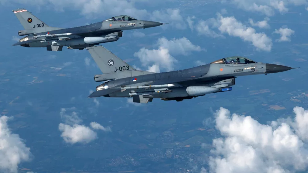 Netherlands' Air Force F-16 fighter jets fly during a media day illustrating how NATO Air Policing safeguards the Allies' airspace in the northern and northeastern region of the Alliance, July 4, 2023. REUTERS/Piroschka van de Wouw