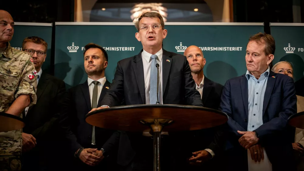 Simon Kollerup, Danish Minister of Defense Troels Lund Poulsen, Carsten Bach and Peter Juel-Jensen attend a press conference on the acquisition of ground-based air defence, at the Ministry of Defence in Copenhagen, Denmark, September 12, 2025. Ritzau Scanpix/Emil Helms via REUTERS  ATTENTION EDITORS - THIS IMAGE WAS PROVIDED BY A THIRD PARTY. DENMARK OUT. NO COMMERCIAL OR EDITORIAL SALES IN DENMARK.