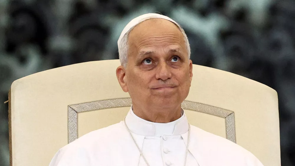 FILE PHOTO: Pope Leo XIV reacts as he holds a general audience in St. Peter's Square at the Vatican, September 10, 2025. REUTERS/Guglielmo Mangiapane/File Photo