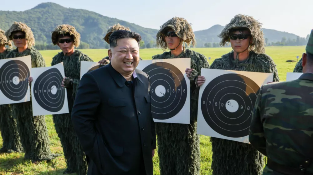HANDOUT - 13 September 2025, North Korea, --: A photo released by the North Korean State News Agency (KCNA) on September 12, 2025 shows North Korean leader Kim Jong-un (C) overseeing a shooting contest between troops of the sniper subunits belonging to the metropolitan garrison command and the special mobile force of the central security organ. Photo: -/KCNA/KNS/dpa - ATTENTION: editorial use only and only if the credit mentioned above is referenced in full
