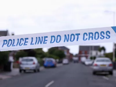 FILE PHOTO: Police tape outlines a perimeter, in Maple street, near a tribute for the victims of a knife attack in Southport, Britain, August 2, 2024. REUTERS/Manon Cruz/File Photo
