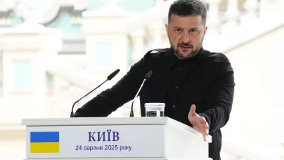 Ukrainian President Volodymyr Zelenskyy answers a question as he joins Prime Minister Mark Carney for a joint press conference at Mariinskyi Palace in Kyiv, Ukraine on Sunday, Aug. 24, 2025. (Sean Kilpatrick/The Canadian Press via AP) 