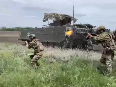 In this photo taken from video distributed by Russian Defense Ministry Press Service on Saturday, July 19, 2025, assault troops of the Russian Army attend a training to hone their combat skills at one of the rear training grounds in an undisclosed location in Ukraine. (Russian Defense Ministry Press Service via AP)