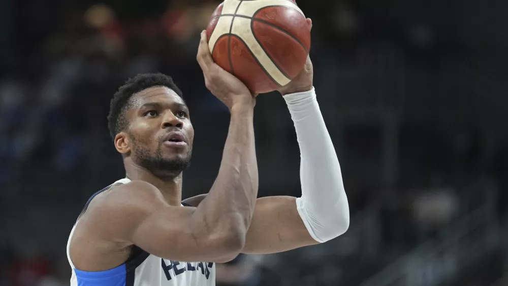 Greece's Giannis Antetokounmpo shoots during the Eurobasket, European Basketball Championship semi-final match between Greece and Turkey at the Riga Arena in Riga, Latvia, Friday, Sept. 12, 2025. (AP Photo/Sergei Grits)
