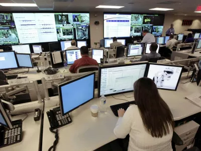 In this Sept. 24, 2010, file photo the National Cybersecurity & Communications Integration Center (NCCIC) prepares for the Cyber Storm III exercise at its operations center in Arlington, Va. It will take several more years for the government to install high-tech systems capable of detecting and blocking computer intrusions, giving hackers more time to figure out how to breach networks and steal sensitive data. The government's computer security weaknesses were laid bare with the WikiLeaks release. (AP Photo/J. Scott Applewhite, File)