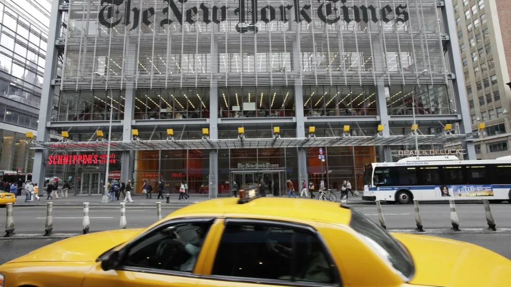 ﻿FILE - In this Tuesday, Oct. 18, 2011, file photo, traffic passes the New York Times building, in New York. The New York Times Co. reports financial earnings on Wednesday, May 3, 2017. (AP Photo/Mark Lennihan, File)